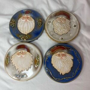 4 ceramic Santa Clause coasters
